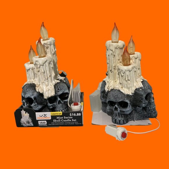 Halloween Misting Skull With Flickering Candle Lights Set of 2 - Picture 1 of 9